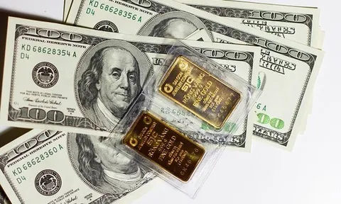 Vàng giảm nhẹ, tỷ giá tiếp tục tăng mạnh