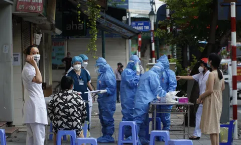 Ngày 14/2, thêm 29.413 ca COVID-19 mới, 20.924 ca trong cộng đồng