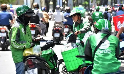 Tài xế và khách hàng bối rối với phí 'nắng nóng' của Grab